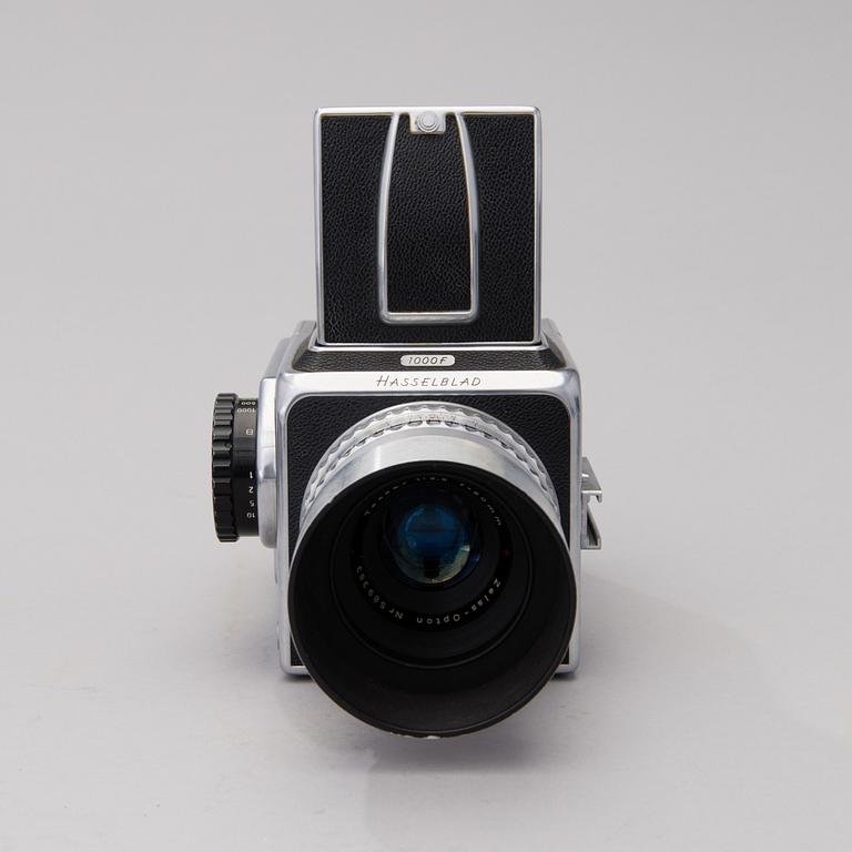 A 1955 HASSELBLAD 1000F CAMERA WITH ACCESSORIES.