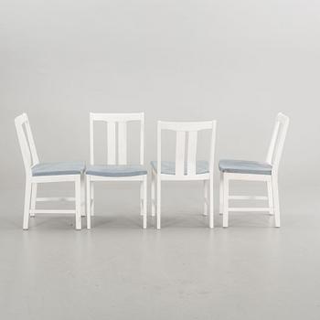 A DINING TABLE WITH EIGHT CHAIRS, second half of the 20th century.