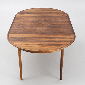 A Rosewood dining table and four chairs, Denmark. 1960-tal.