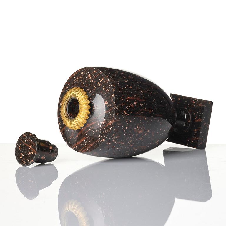 A late Gustavian 'Rännås' porphyry urn, early 19th century,