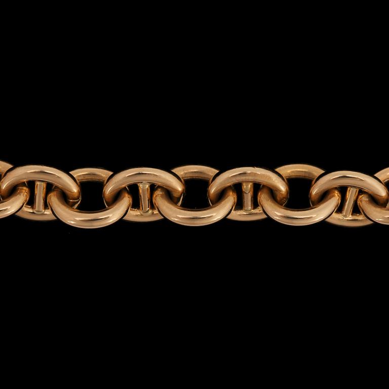 A Gucci bracelet.