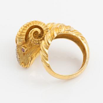 An 18K gold ram´s head ring set with round brilliant-cut diamonds and rubies.