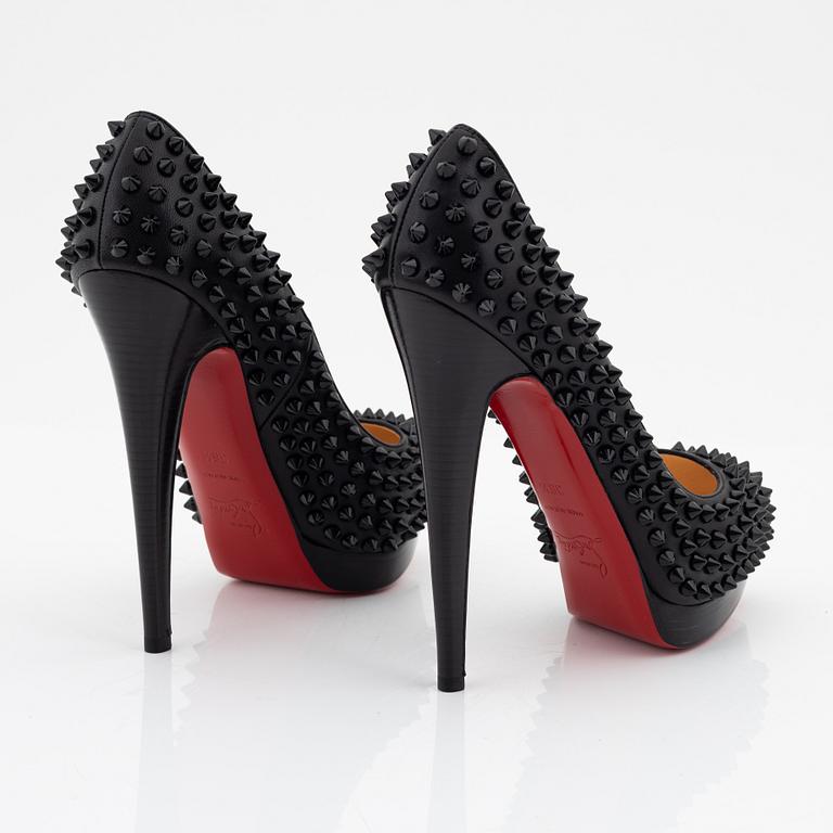 Christian Louboutin, a pair of black leather and studs pumps, size 36 1/2.