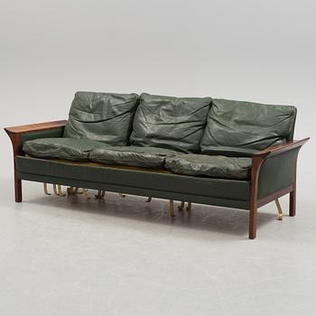 A 1960's Danish sofa, with 2 easy chairs and 2 tables by Glostrup.