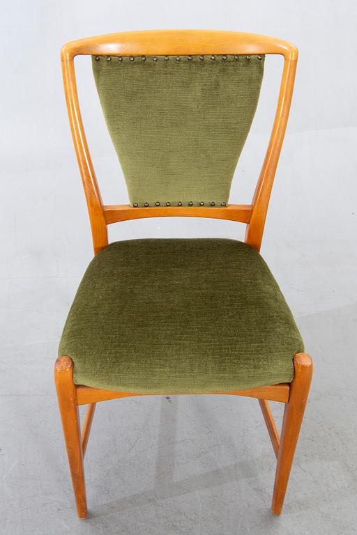 David Rosén, A table and flour chairs.