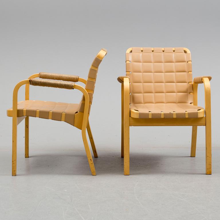 ALVAR AALTO, a pair of mode 45 leather upholstered birch armchairs from Artek, Finland.