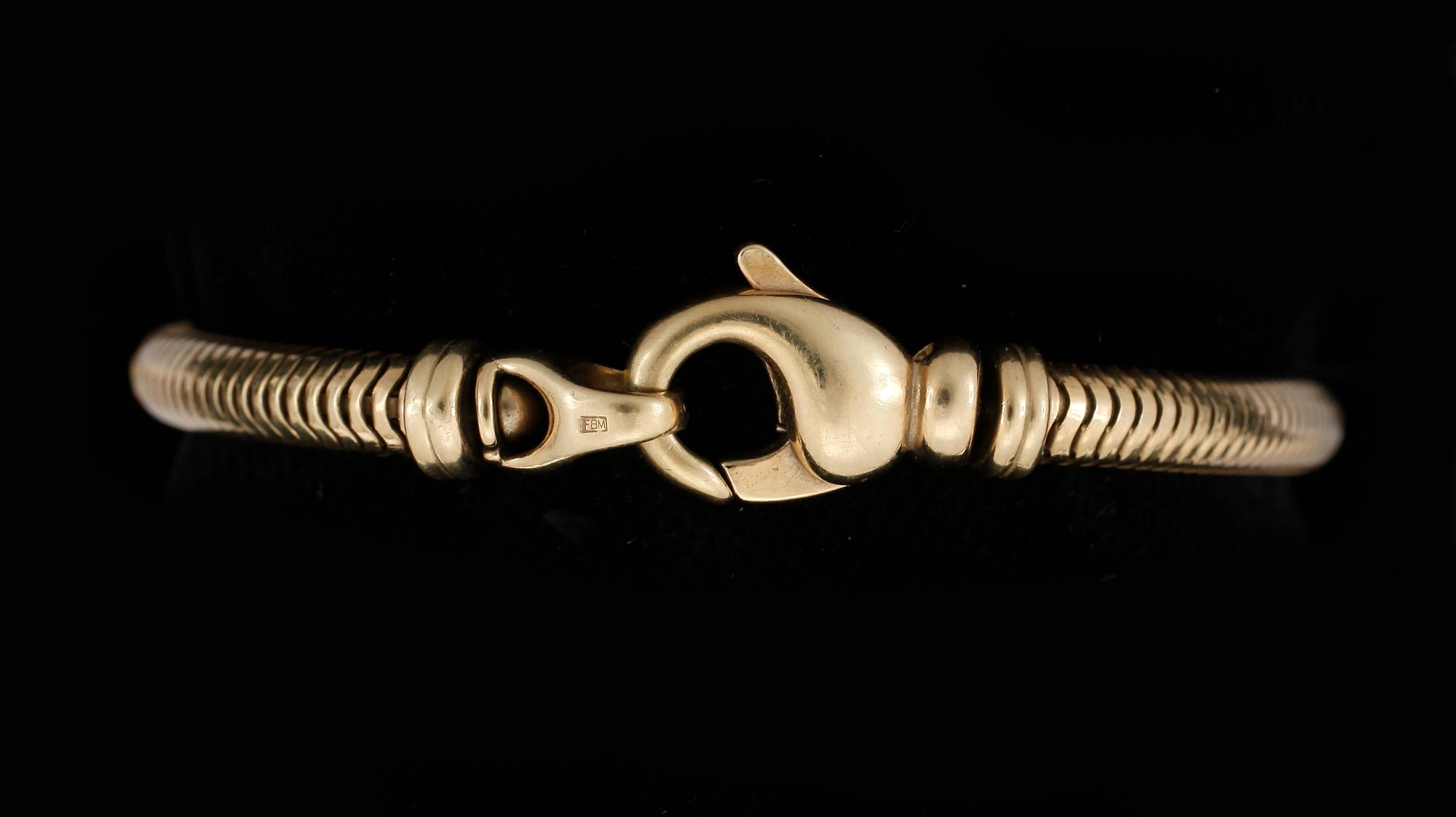 ARMBAND, 18 K guld, ca 29 g.