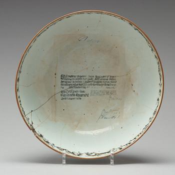 A grisaille punch bowl with a Swedish Bank note, Qing dynasty, Qianlong dated 1762.