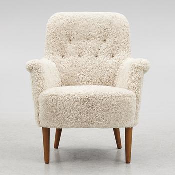 Carl Malmsten, a "Husmor" armchair, O.H.Sjögren, Tranås, 1984.