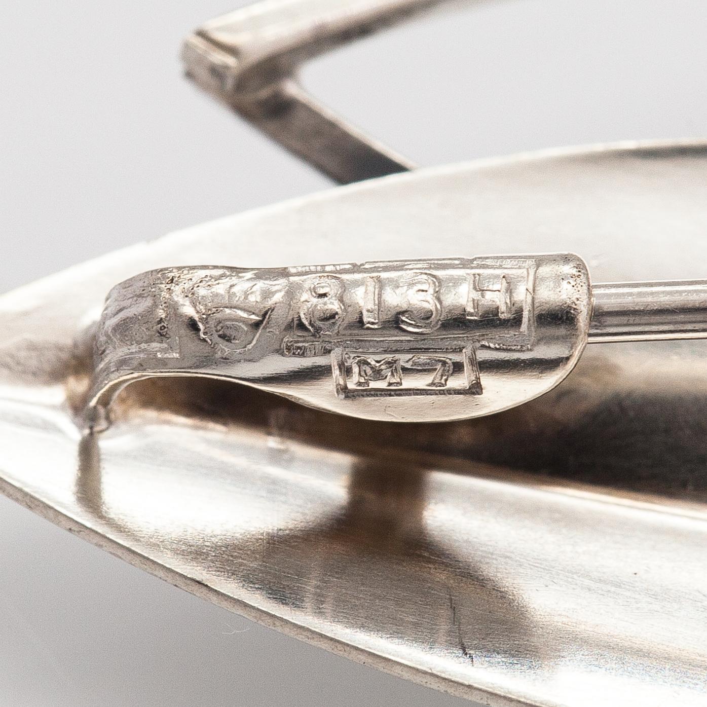 Elis Kauppi, Two silver brooches, one with a tuquoise. Kupittaan kulta, Turku 1961 and 1965.