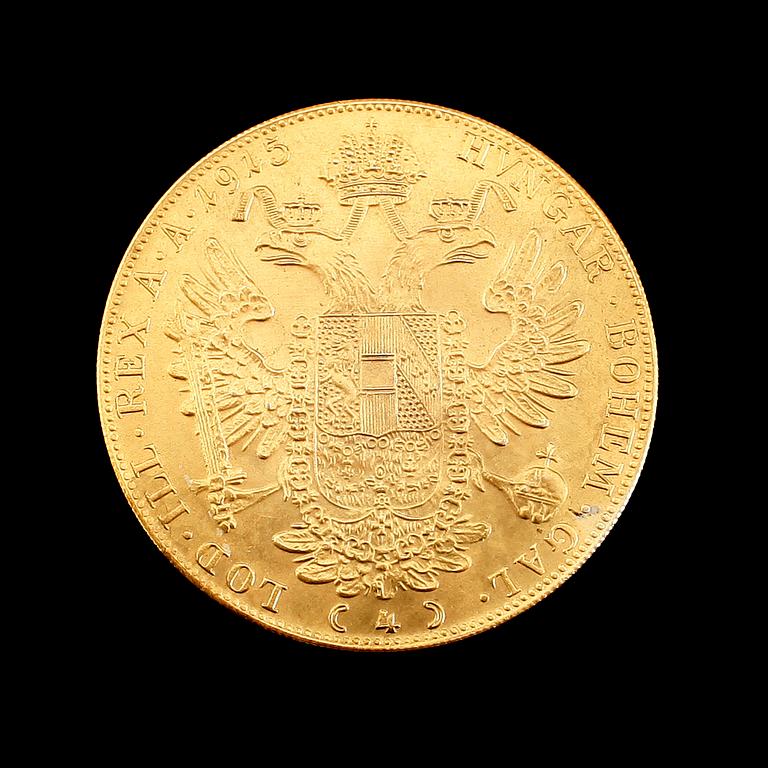 GULDMYNT, 4 dukater, Österrike-Ungern, daterad 1915. Vikt ca 10 gram.