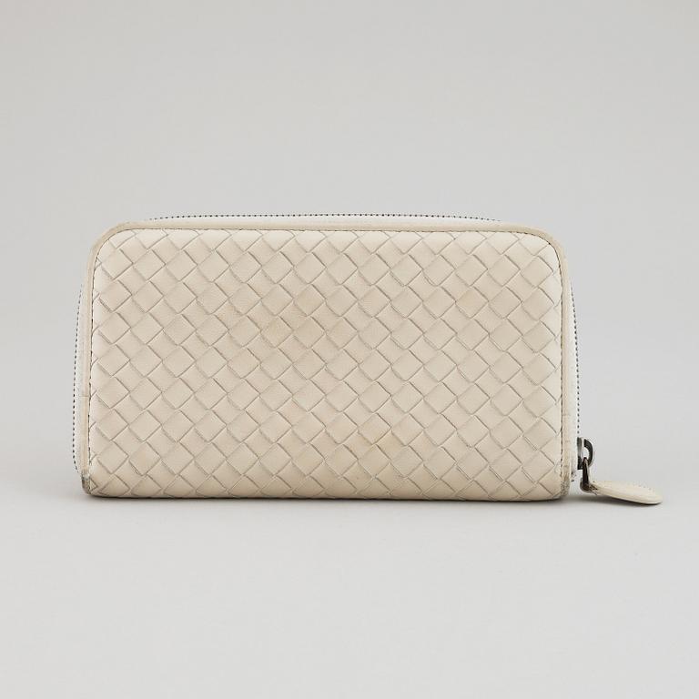 BOTTEGA VENETA, a intrecciato leather wallet.