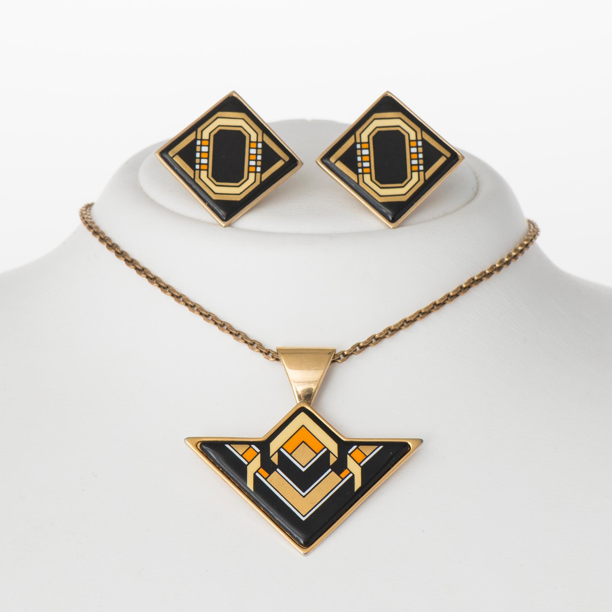 A NECKLACE and A PAIR OF EARRINGS, costume jewelry, Michaela Frey.
