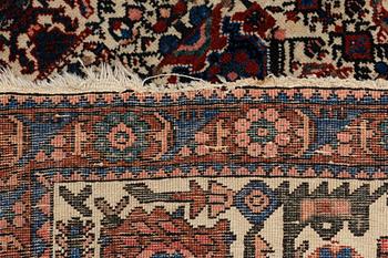 An oriental rug, c. 290 x 205 cm.