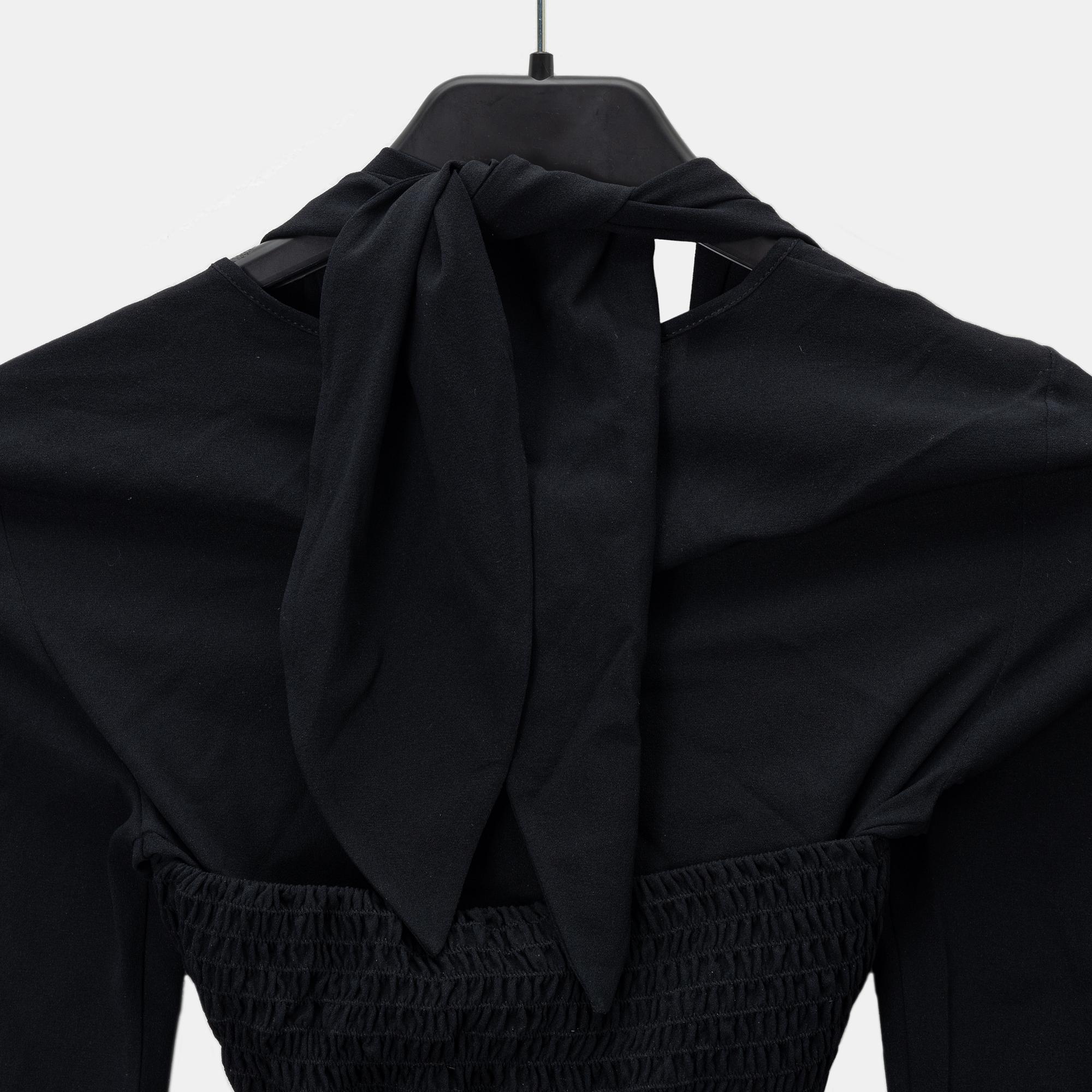 Chanel, A black silk top, size 34.