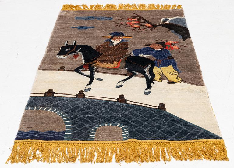 A rug, figural, silk, China, approx. 186 x 94 cm.