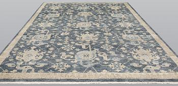 A oriental carpet, ca 373 x 269 cm.