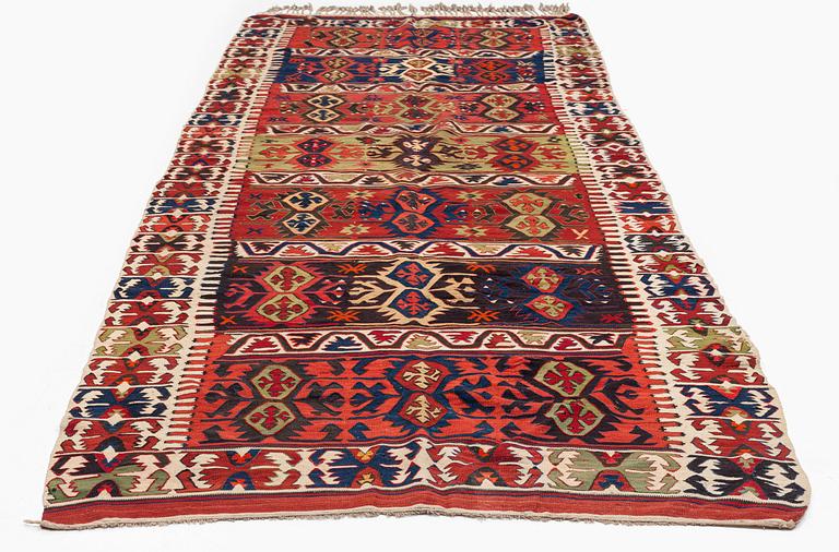 An antique southeast Anatolian kilim, c. 412 x 163 cm.