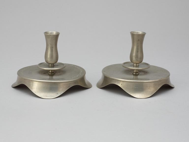 A pair of pewter candlesticks by Svenskt Tenn, Stockholm 1928.