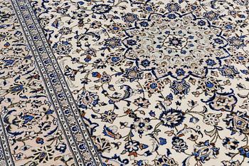 A carpet, Keshan, c. 353 x 241 cm.