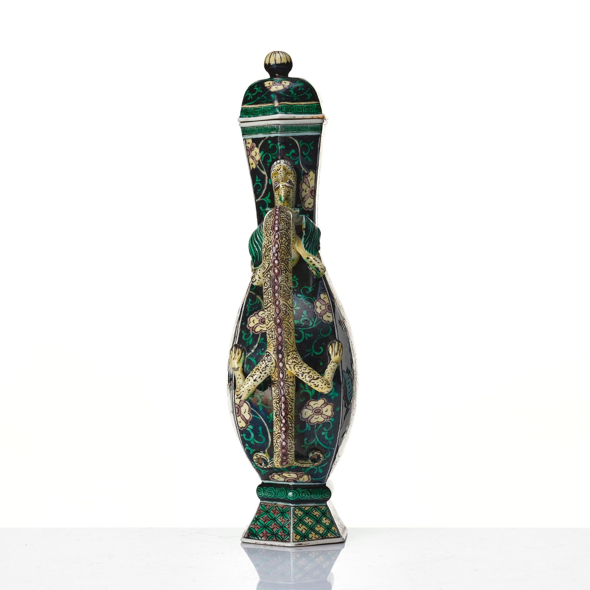 A famille noire ewer with cover, Qing dynasty, 19th Century with Kangxi six character mark.