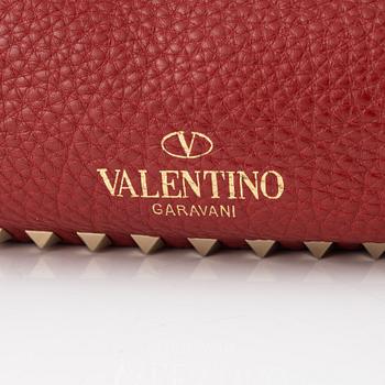 Valentino Gravani, a red leather studded tote bag, 2018.