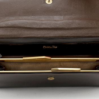 CHRISTIAN DIOR, a brown calf leather clutch / evening bag.