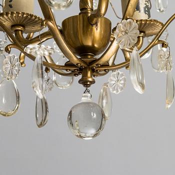 Paavo Tynell, a mid-20th century '1457/3' chandelier for Taito.