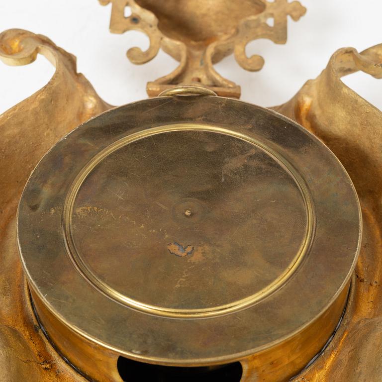 A bronze wall clock, Louis XVI style, France, circa 1900.