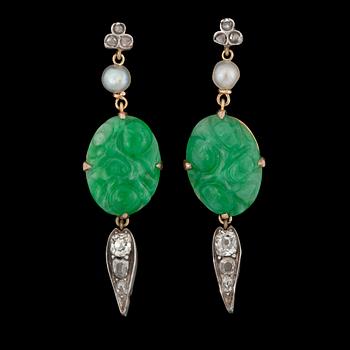 865. A pair of carved untreated jadeite, pearl and diamond earrings. Total carat weight of diamonds circa 0.40 ct.