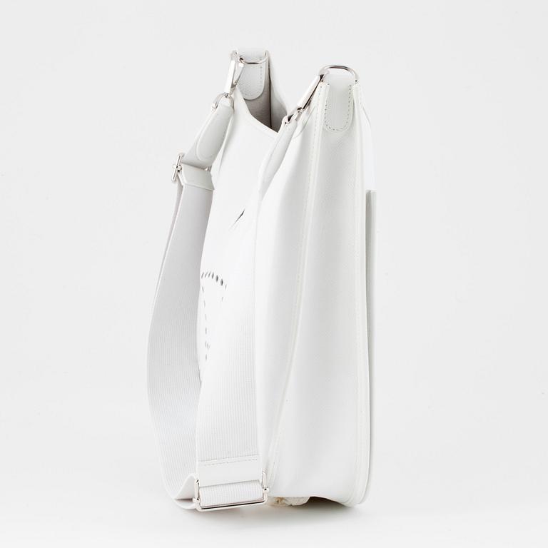 HERMÈS, a white leather shoulderbag, "Evelyn".