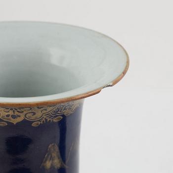 A pair of powder blue and gold 'trumpet' vases, Qing dynasty, 18th century.