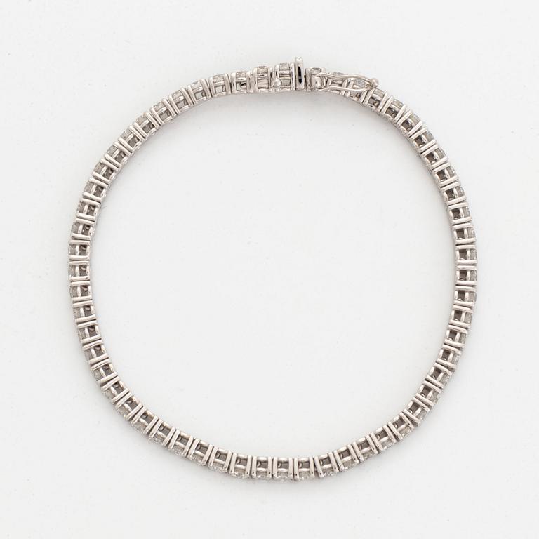 Brilliant-cut diamond tennis bracelet, with report HRD.