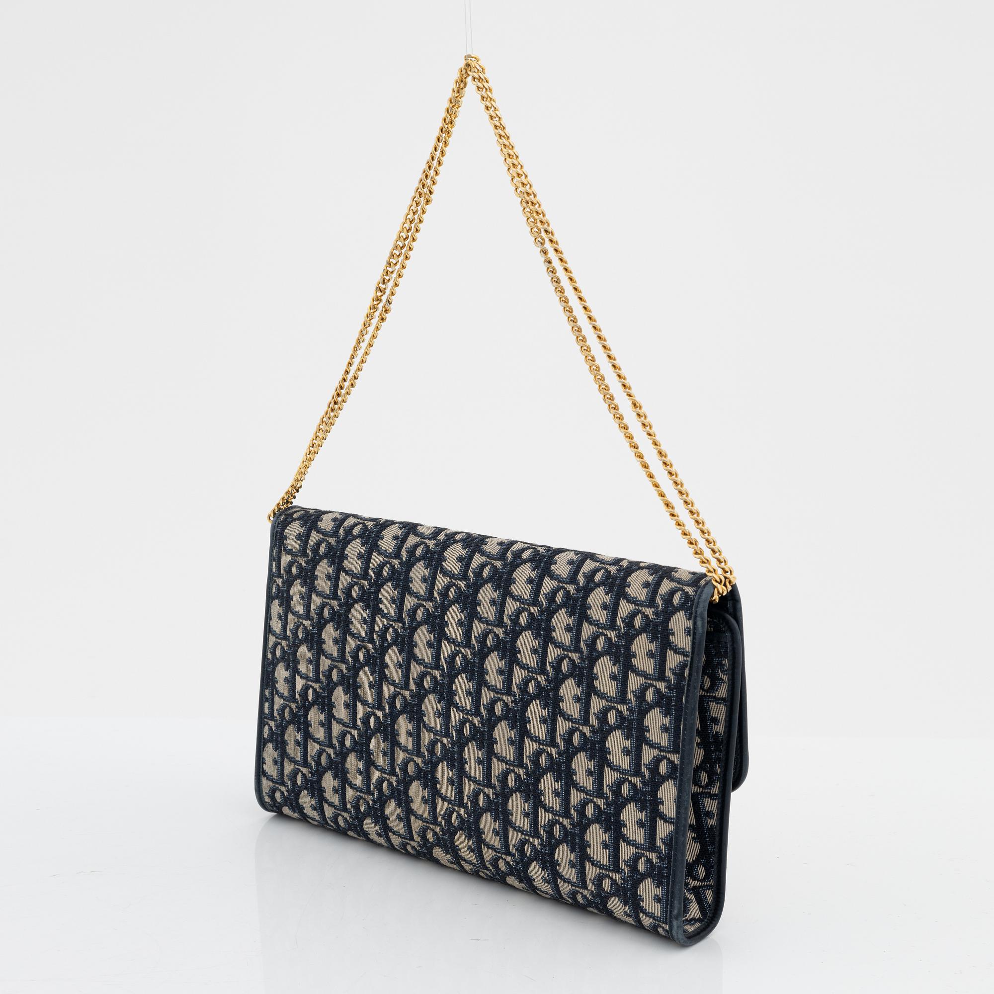 Dior canvas clutch hotsell