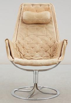 A Bruno Mathsson beige leather and chromed steel 'Jetson' easy chair, DUX.