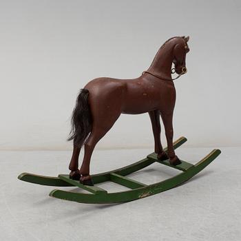 An early 20th century rocking horse.