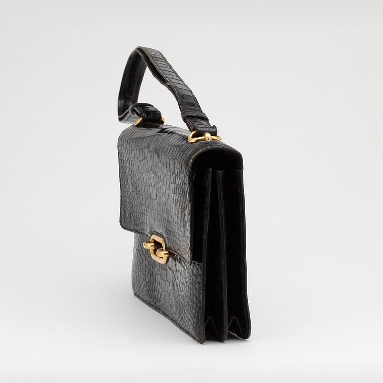 HERMÈS, a black crocodile leather shoulder bag.