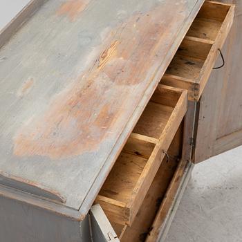 A Gustavian cupboard, circa 1800.