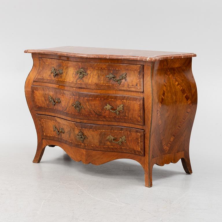A rococo chest of drawers, mid 18th Century.