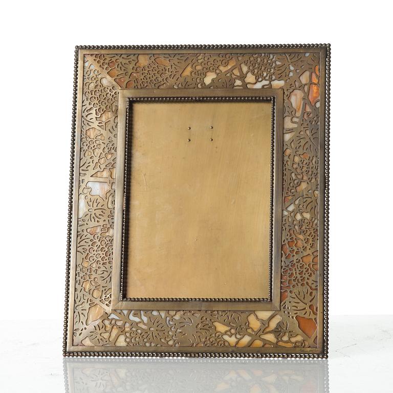 Tiffany Studios, two metal and glass desk picture frames, New York, early 20th century, model 918.