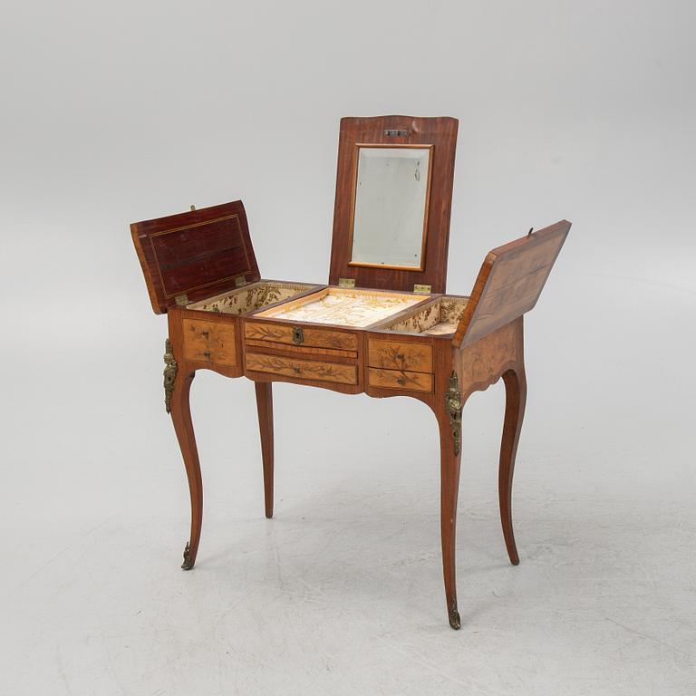 A Louis XV style dressing table, early 20th Century.