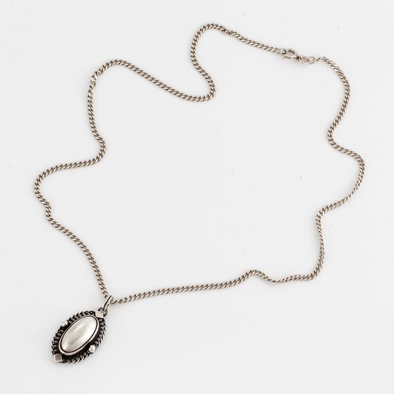 Georg Jensen pendant of the year 2004, with chain,, sterlingsilver.