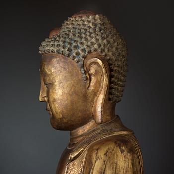 A large gilt bronze figure of Buddha, Ming dynasty (1368-1644).