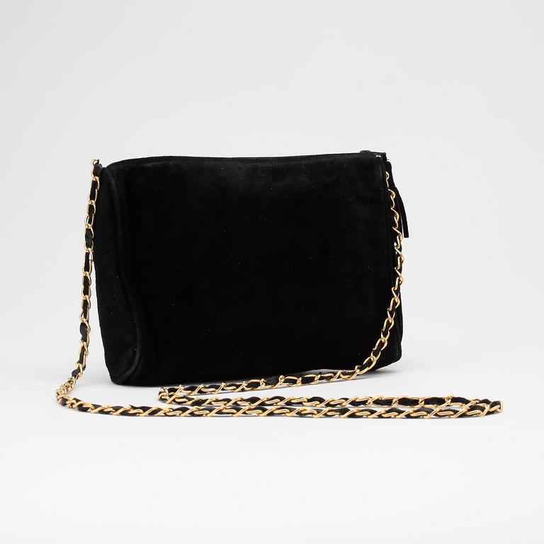 YVES SAINT LAURENT, a black suede shoulder bag.