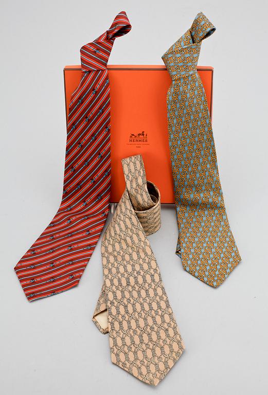 A set of three silk ties by Hermès.