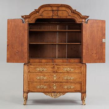 A Swedis Rococo 18th century cupboard.