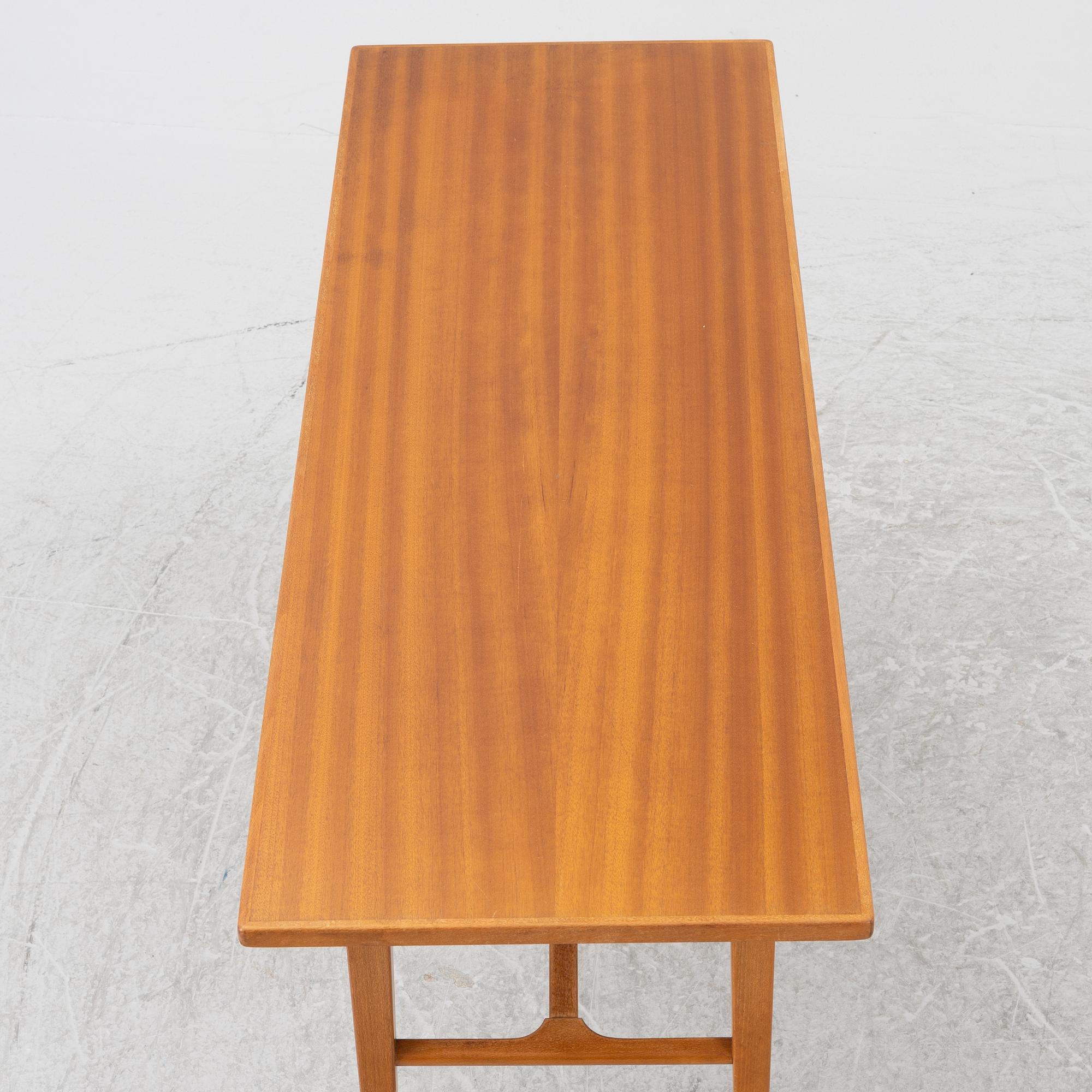 A coffee table/side table, Blomstermåla, circa the mid-20th century.