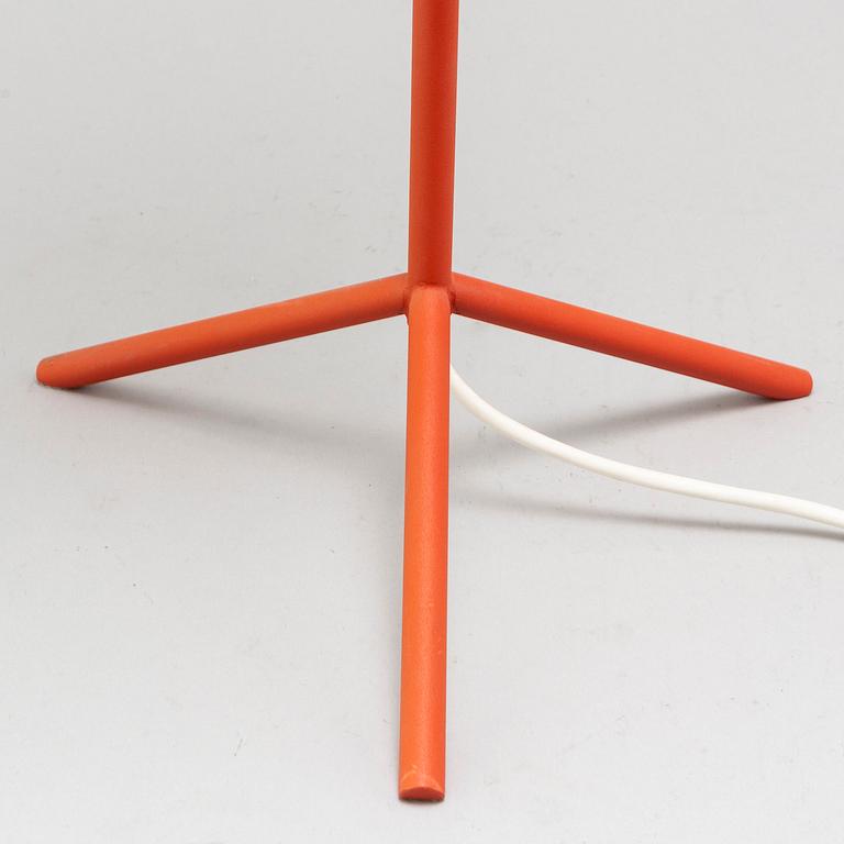 A metal table lamp designed by Thomas Bernstrand and Mattias Ståhlbom for Zero.