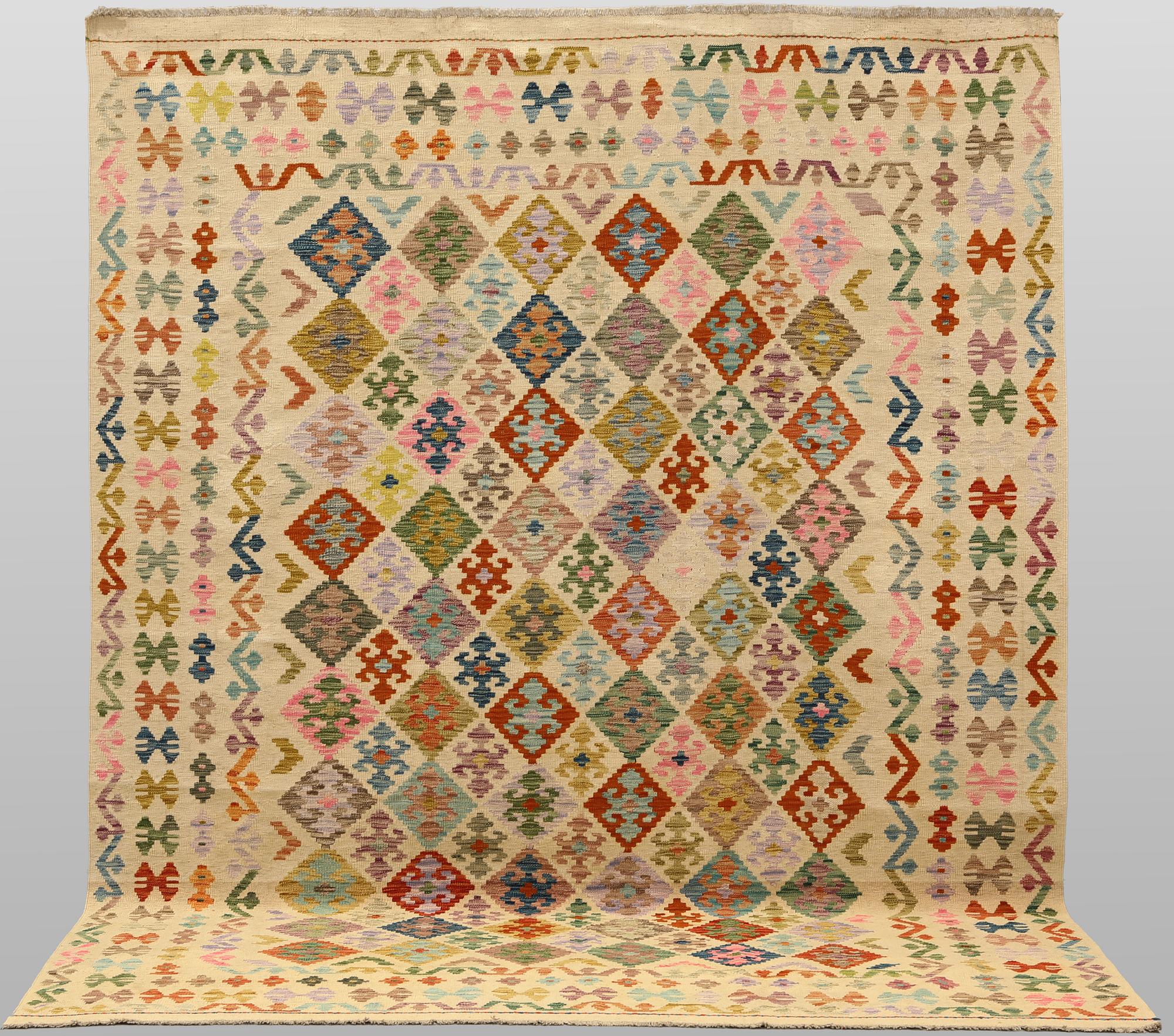 A Kilim rug, approx. 295 x 243 cm.