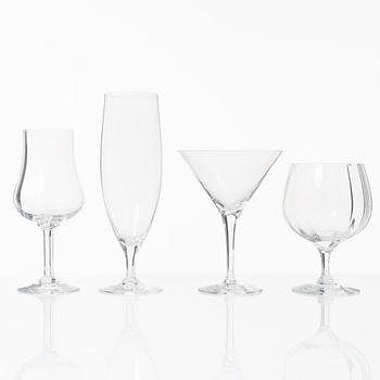 A set of 46 glass service parts, including 'Elixir Connoisseur' and Gunnar Cyrén, 'Optica', Orrefors.
